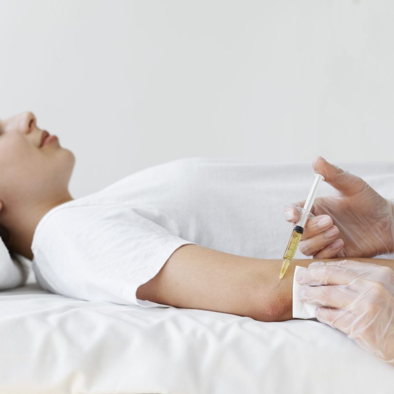 Patient relaxing in a comfortable chair during IV therapy