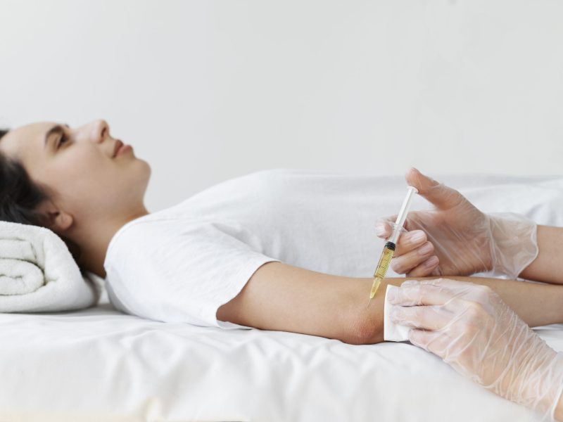 Patient relaxing in a comfortable chair during IV therapy